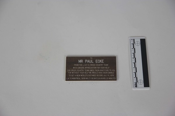 Plaque from L.A.P.D Cross Country Team to Paul Ecke